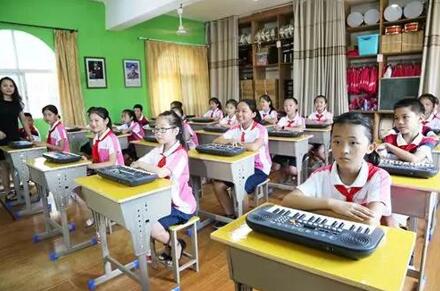 思源工程“帮帮公益”音乐教室落成仪式在江西举行.jpg