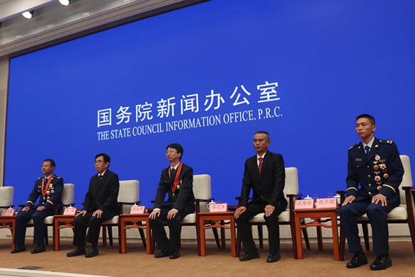 国新办举行应急管理系统先进典型代表与中外记者见面会.jpg